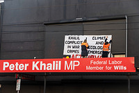 Activists climb Labour Mp office Peter Khalil in Melbourne