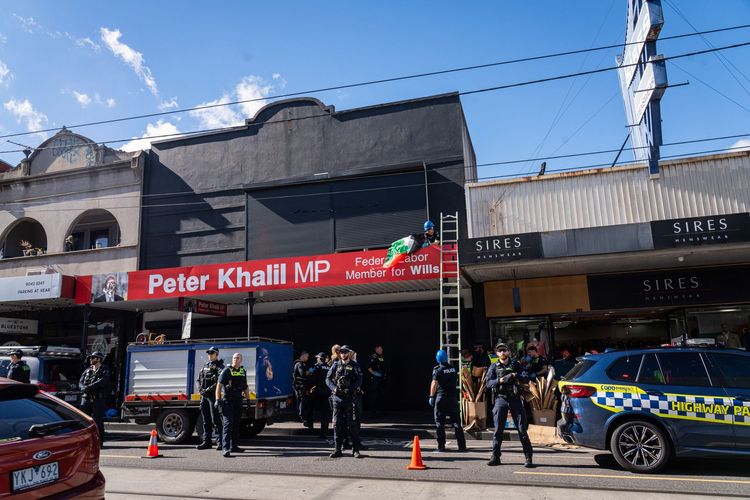 Activists climb Labour Mp office Peter Khalil in Melbourne